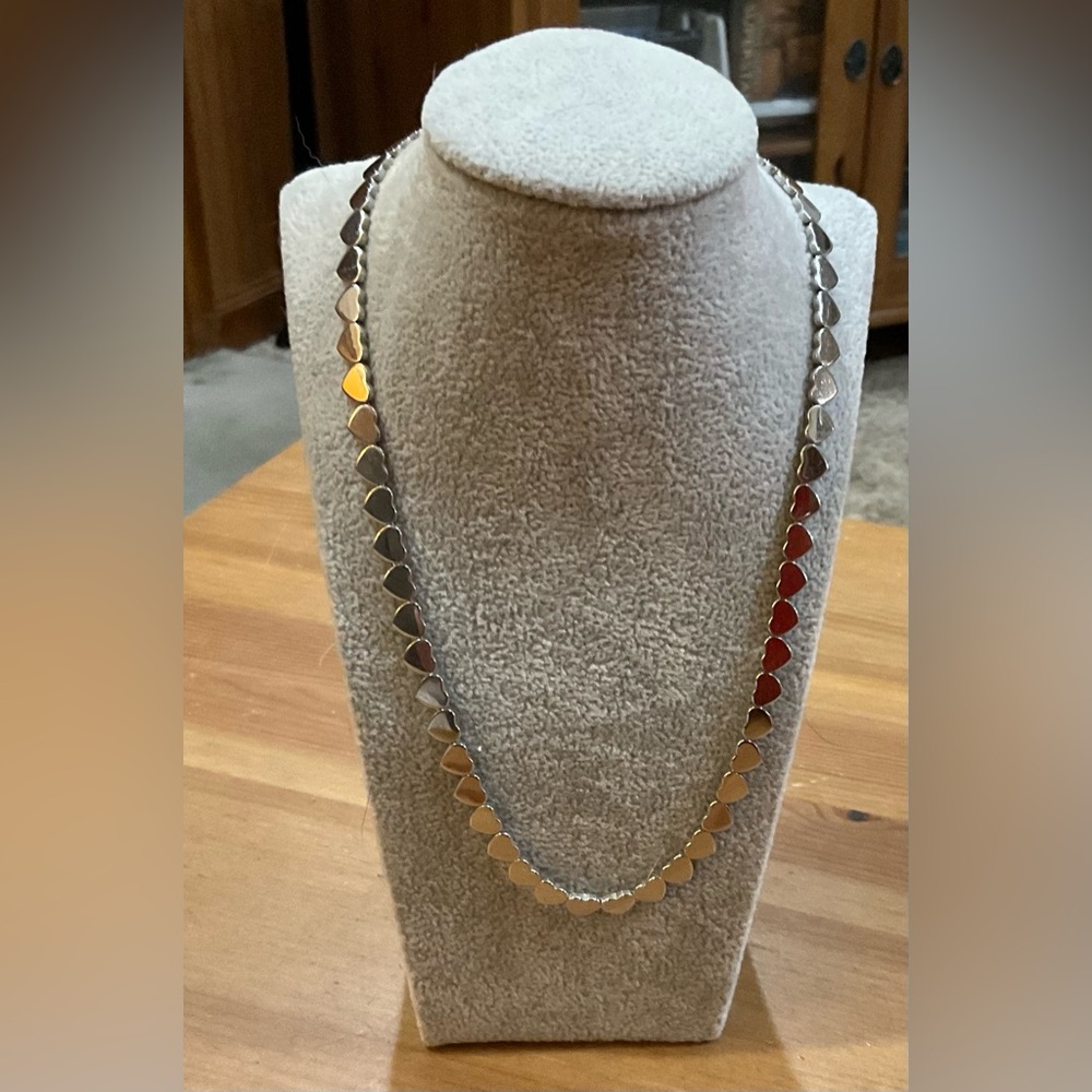 16” inch (chocker) style shiny mirror link row of hearts silver toned necklace.